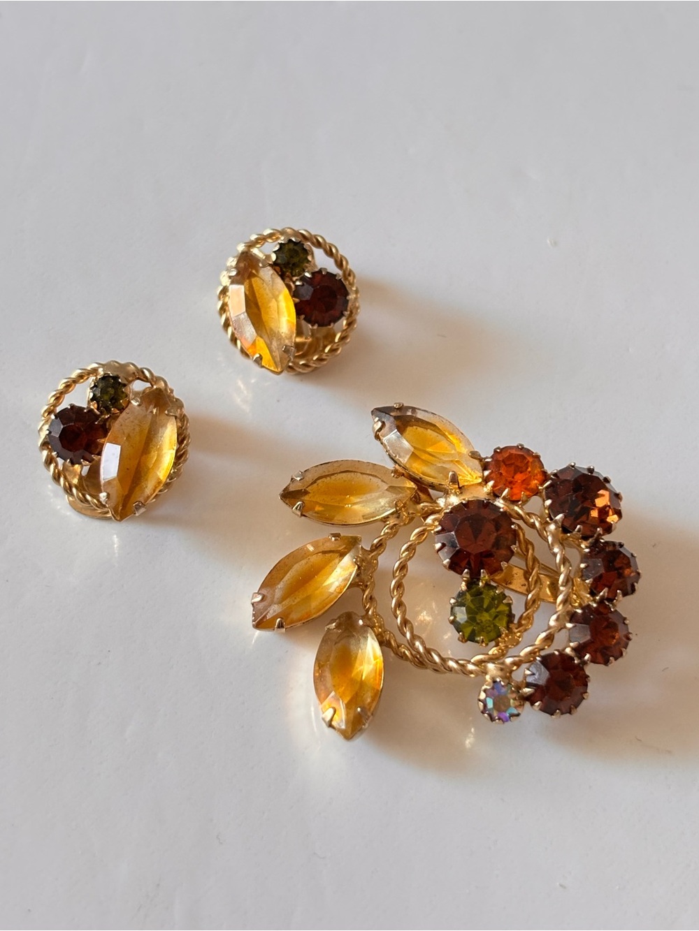 Continental floral brooch and matching clip earrings